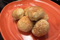 Golden pepperoni and mozzarella stuffed rolls made with frozen bread dough and topped with Parmesan and Italian seasoning.